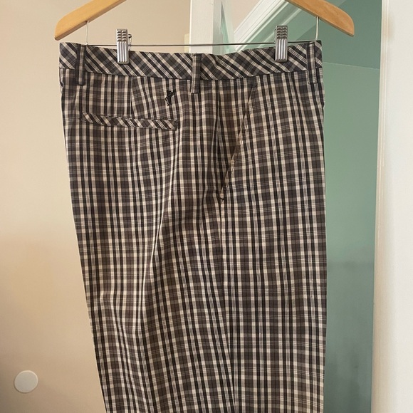 Ashworth Men’s Golf Shorts. Waist size is 35”. Black background with a pattern. - Picture 2 of 6